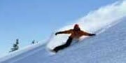 Chalet and snowboard